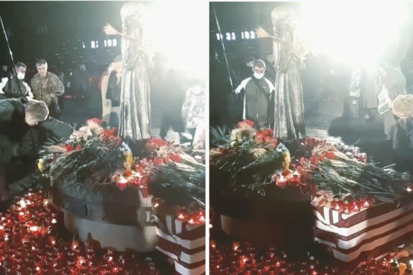 В Киеве пожилой мужчина ел хлеб прямо с мемориала памяти жертв Голодомора