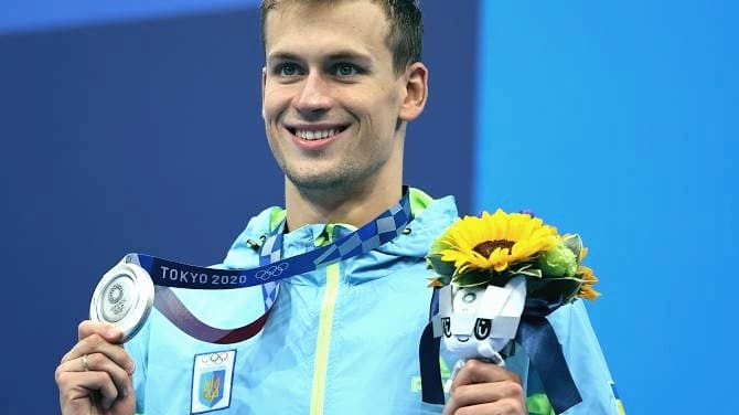 Михаил Романчук с серебряной медалью на Олимпиаде-2020/Reuters, Marko Djurica